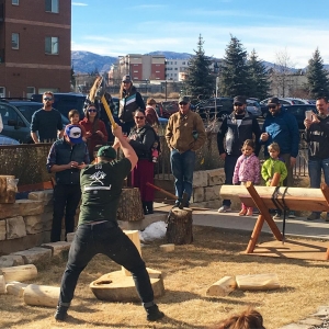 Logging sports participant chopping wood.