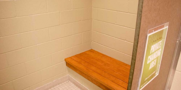 A photo of a private changing area in locker room.